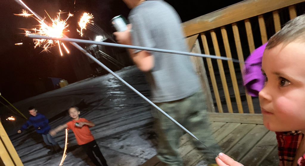 Child with firecracker.
